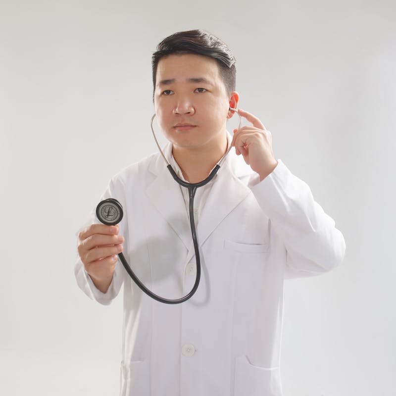 Licensed provider in white coat